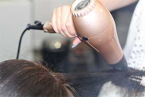 wedding hair being blow dryed