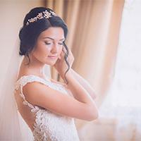 Bride getting ready in room for wedding