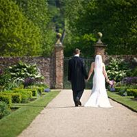 married couple walking hand in hand