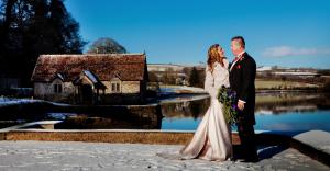 waterside wedding couple, Pentillie Castle, Cornwall