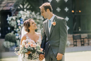 Couple getting married at historic hall